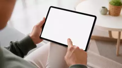 User submitting online form on tablet